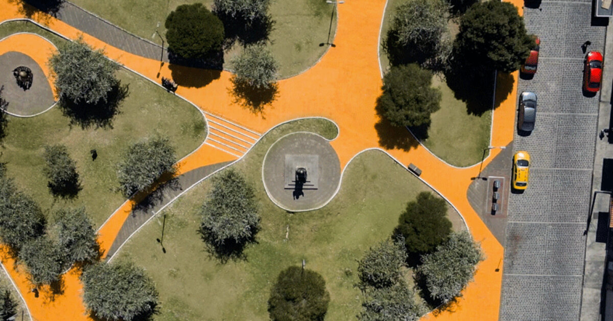 felipe escudero’s orange land art winds 1.6 kilometers through quito’s historic center