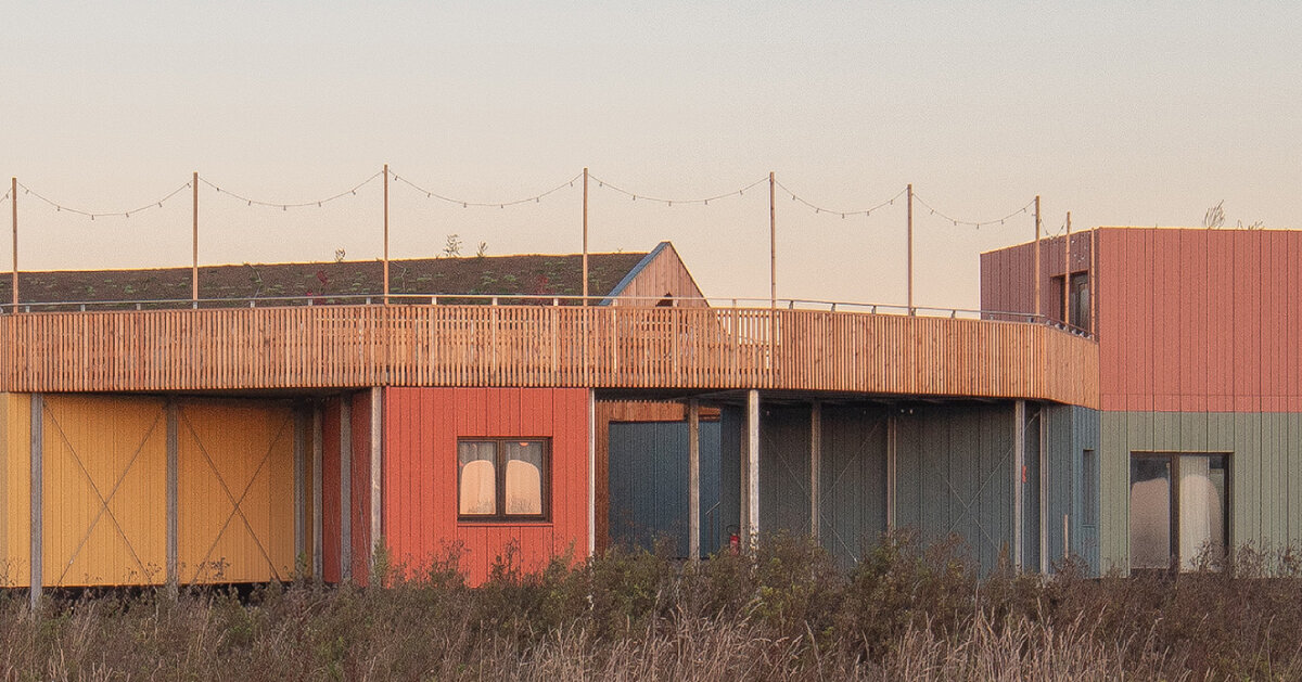 julius taminiau architects composes startup village of colorful wooden modules in germany