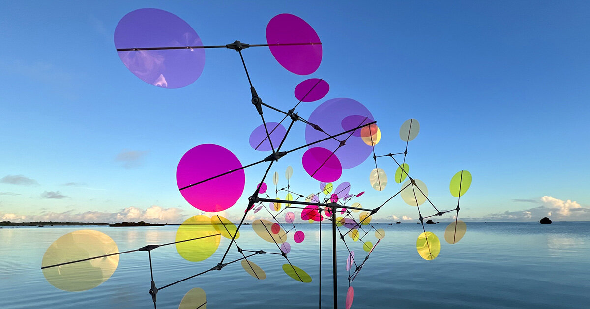 vincent leroy’s multicolored installation turns japanese beach into chromatic landscape