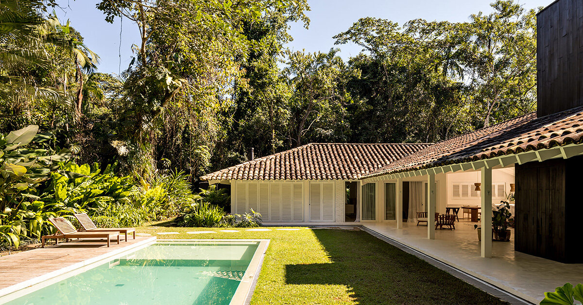 brazilian white residence unfolds under L-shaped roof in felipe hess arquitetos’ renovation