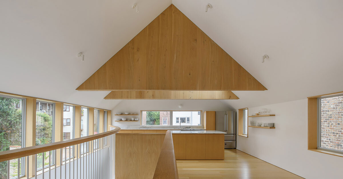 clad in grey and black wood, gabled ardmore house by kwong von glinow stands in chicago