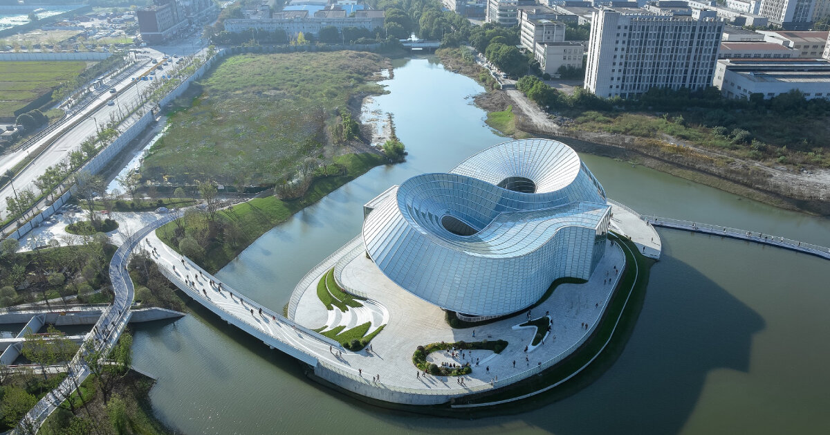 translucent interlocked rings shape aedas’ jade-like yohoo museum in china