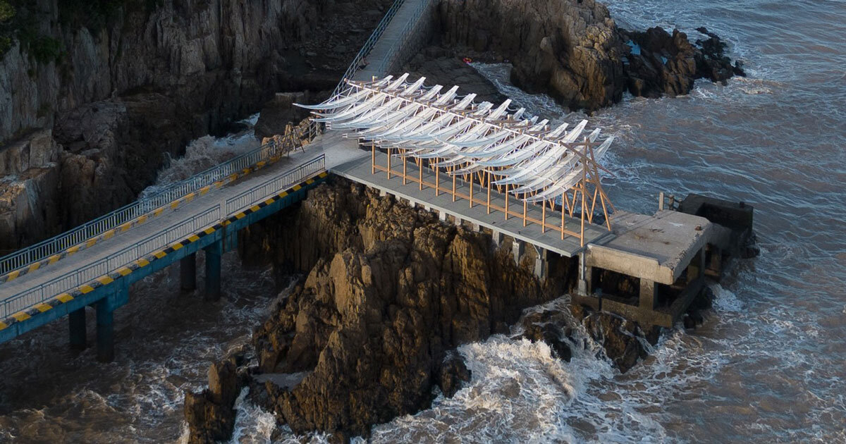 seaside pavilion’s white feather-like blades sway with the wind on chaishan island