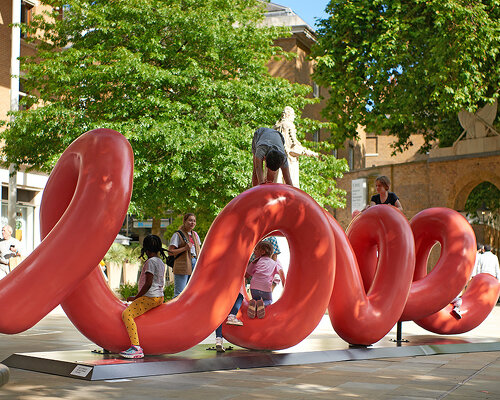 yoni alter's climbable sculpture in london unravels to reveal the word 'love'