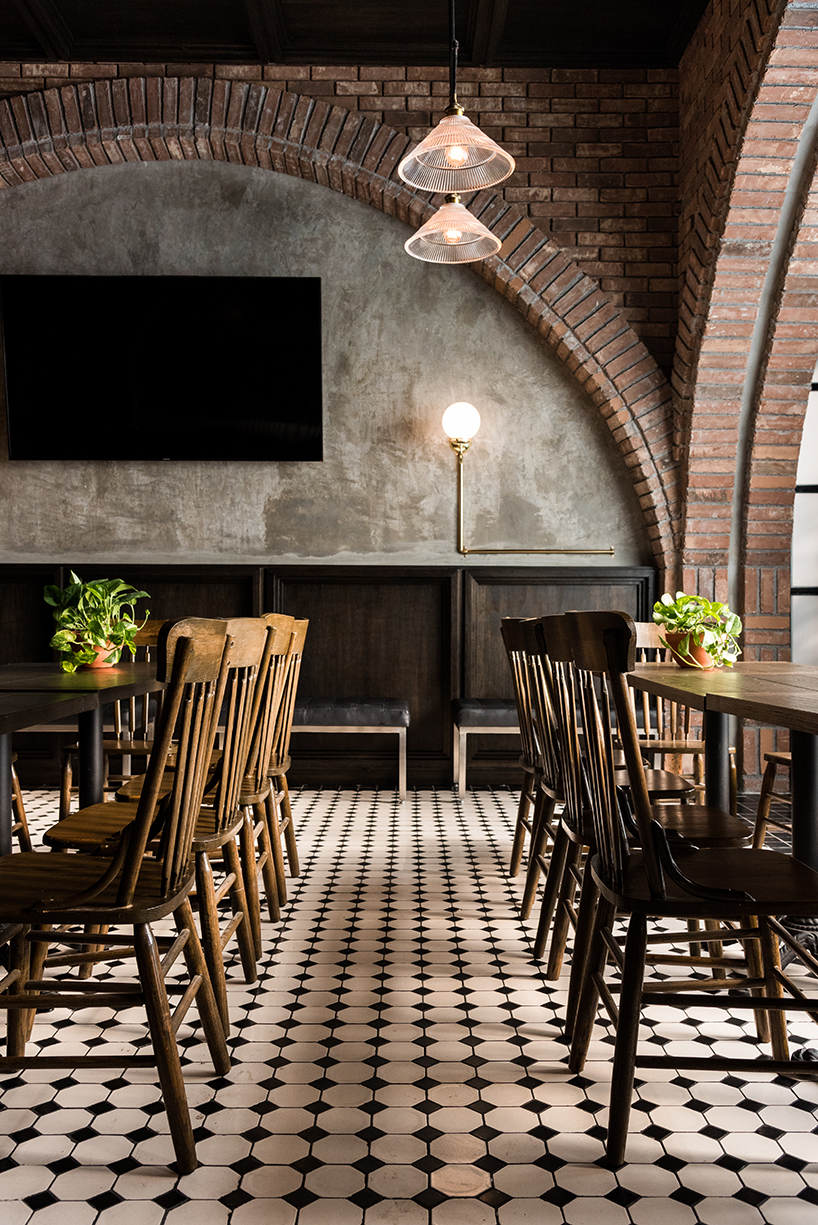 historic 'salón sociedad' transformed into rustic resto-bar in monterrey