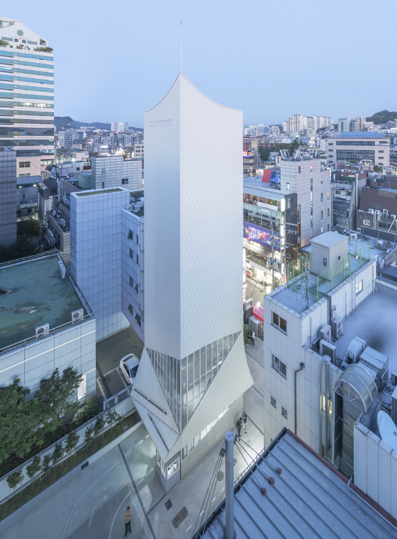 iroje khm architects white boat parking building in seoul