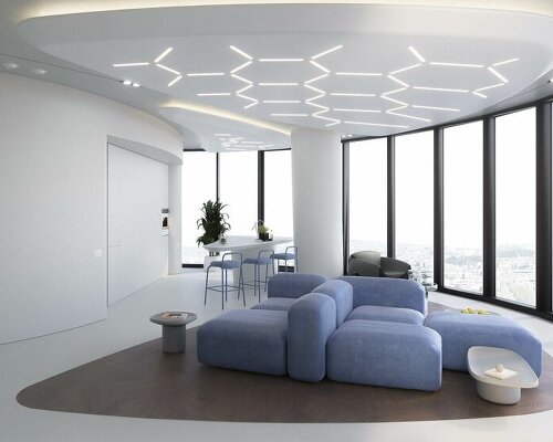 white convex walls dominate the interior of a futuristic apartment in tbilisi, georgia