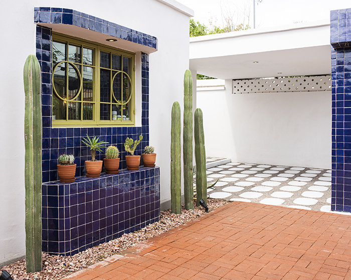 glazed tiles + bold colors decorate this renovated seventies house in mexico