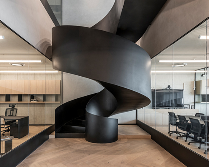 sculptural spiral staircase dominates kering group’s new offices in mexico by fr·ee