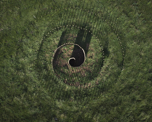 spiral land art by mathieu nouhen conjures mystical undertones in rural france