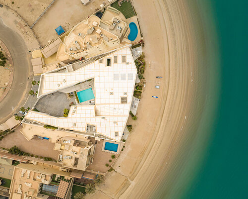 tent house by TAEP/AAP doubles as a light-filled desert camp in kuwait