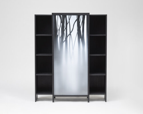 jisu kim's sliding ash wood bookshelf captures the icy chill of a winter forest