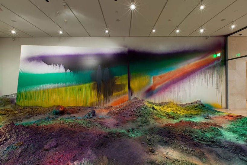 colorful mountains of spray-painted soil by katharina grosse