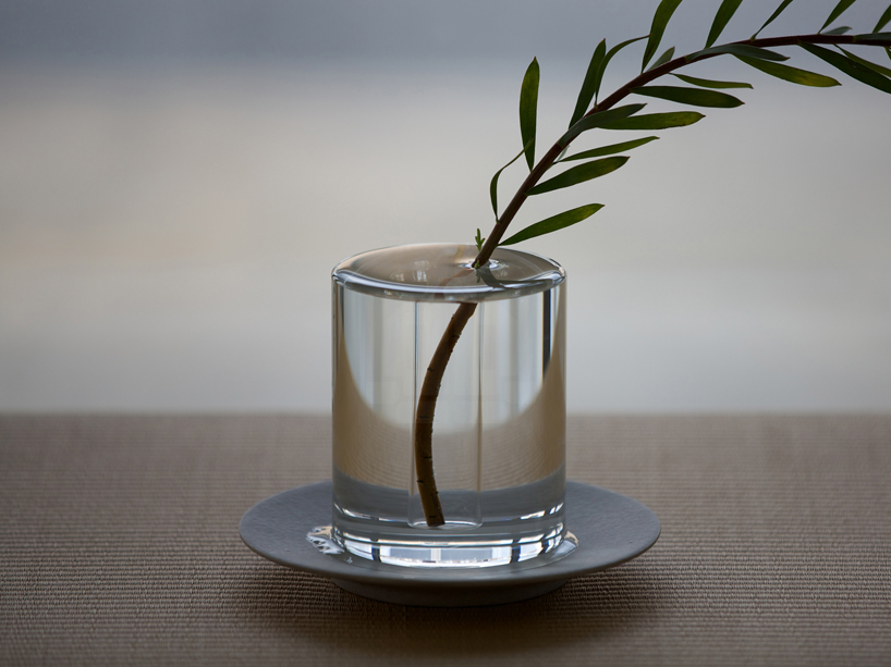 kazunaga sakashita overflows water surface in crystal vase