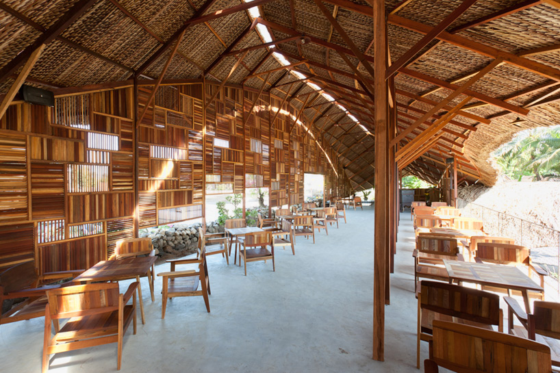 a21studio builds salvaged ring coffee shop from recycled wood