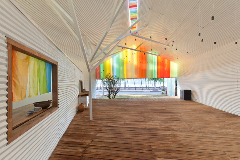 a21studio shades the chapel with colorful curtains in ho