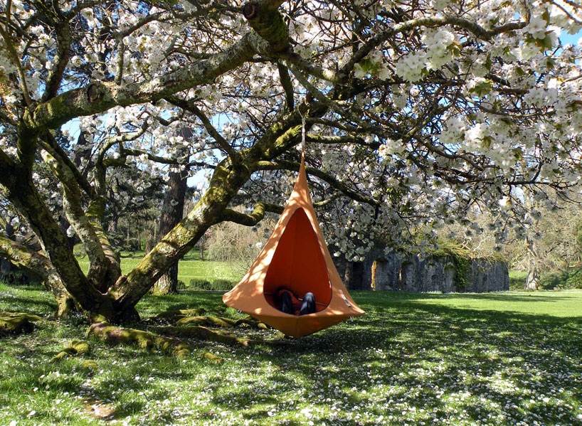 hanginout's cacoon hammock lifts you above the trees