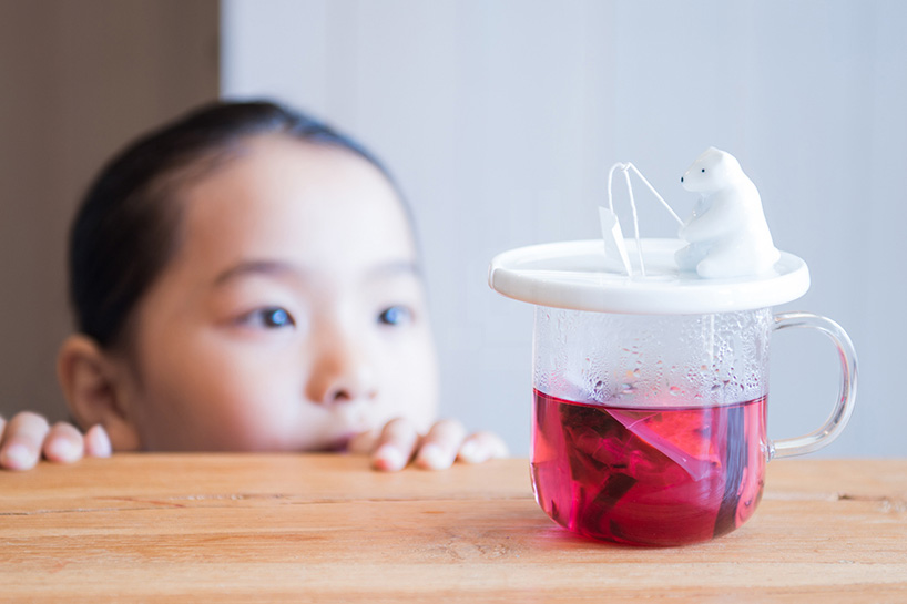 necktie design office steeps tea with a playful ceramic polar bear