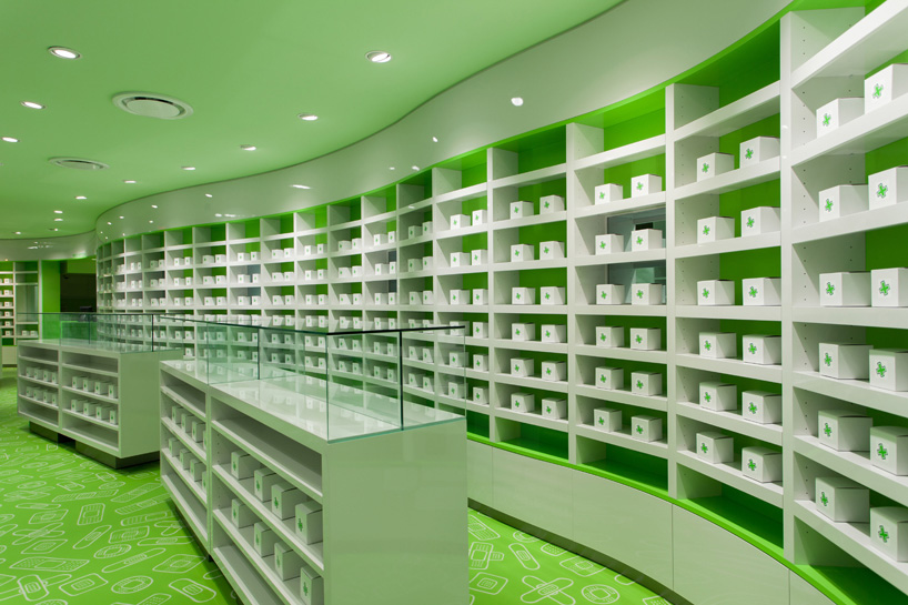 sergio mannino brands careland pharmacy with green furniture + graphics