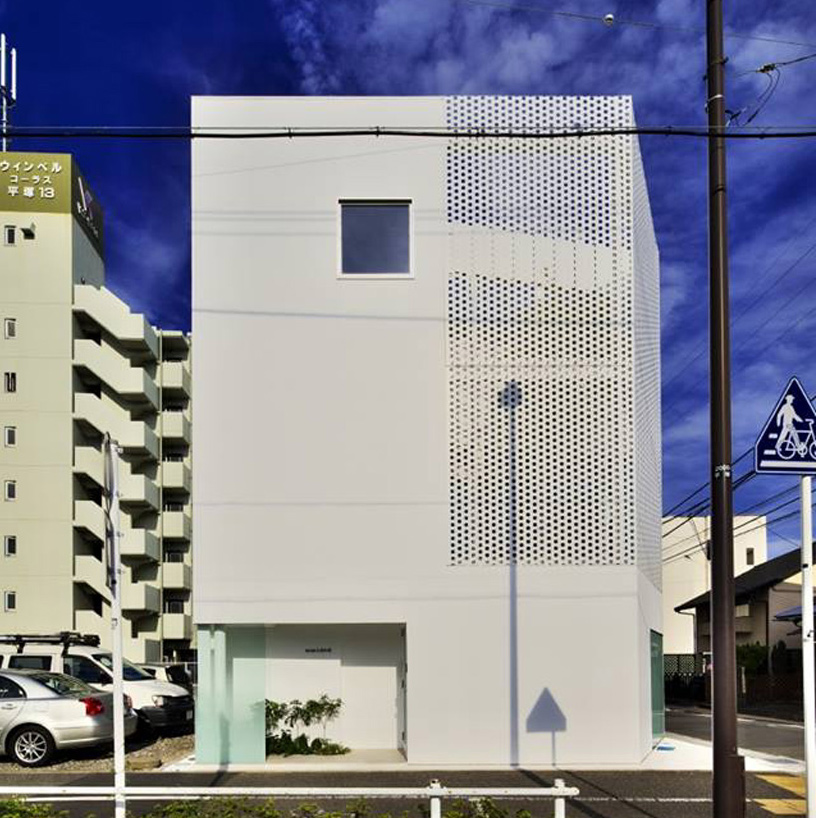 office block in japan by hiroyuki moriyama encloses a planted garden