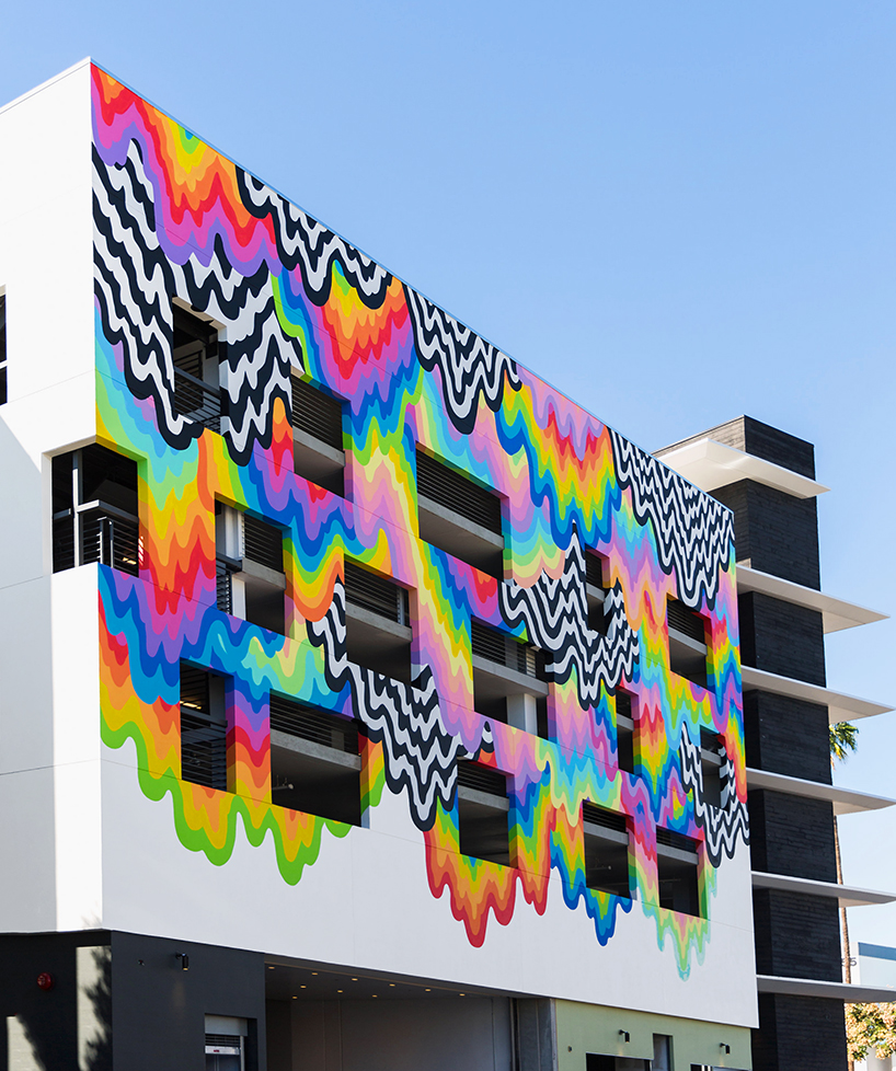 jen stark oozes drippy, technicolor mural across california building façade