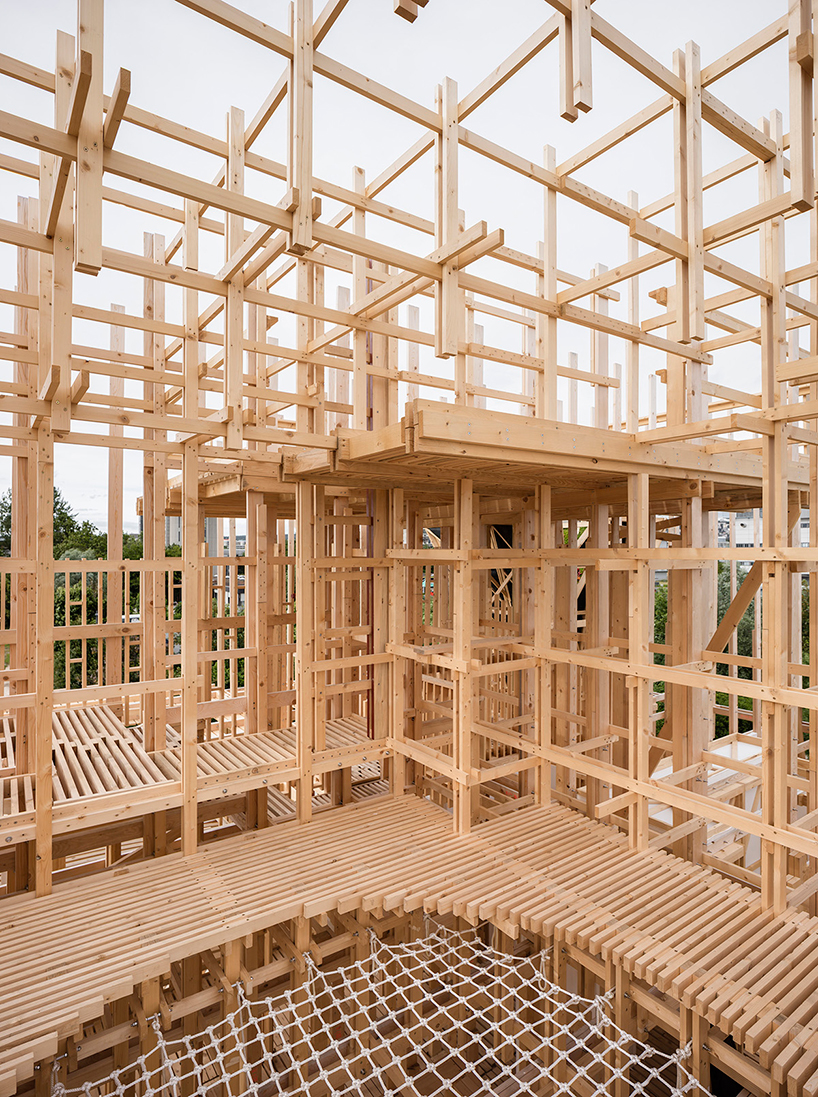 alice-collaboratively-builds-balloon-frame-timber-house-in-lausanne