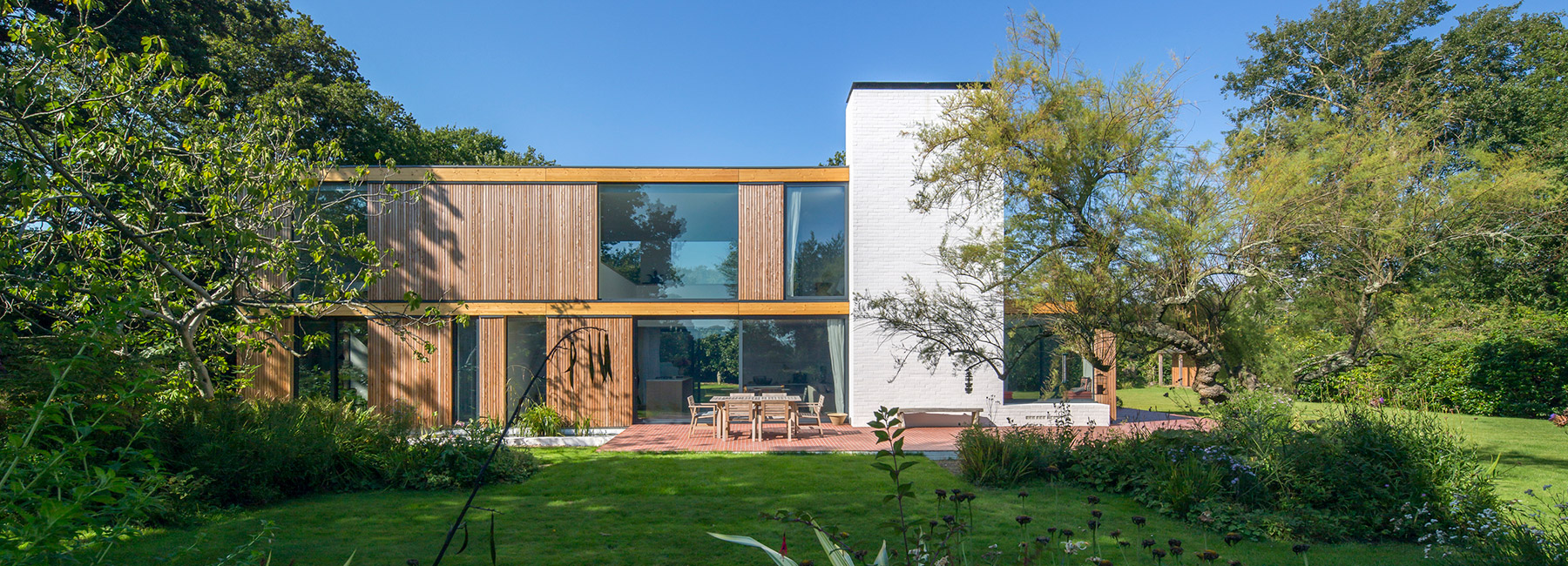 str m architects builds timber framed woodpeckers house