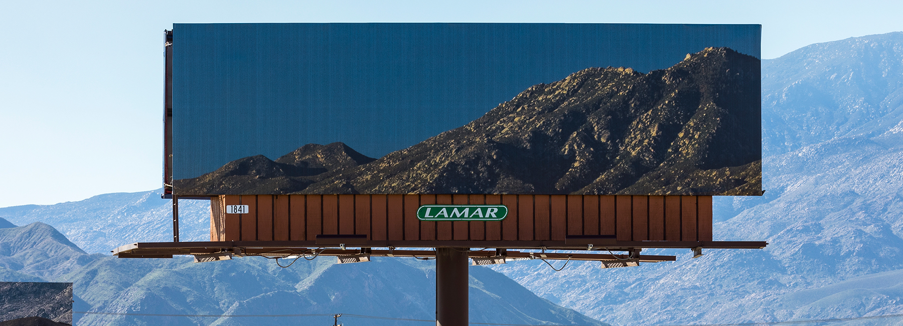 jennifer bolande blends billboards with mountains for desert X