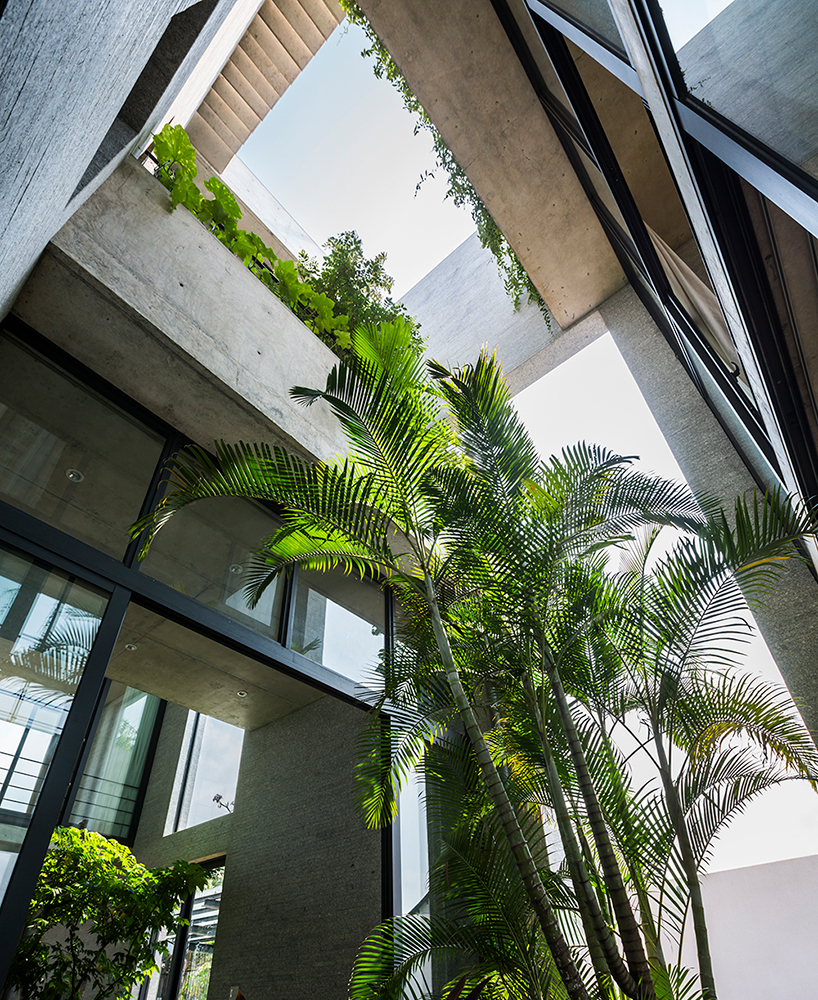 VTN architects vertically stacks gardens inside binh house in vietnam