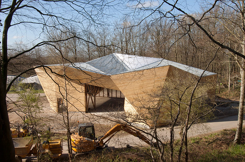 invisible studio completes hooke park big shed with 