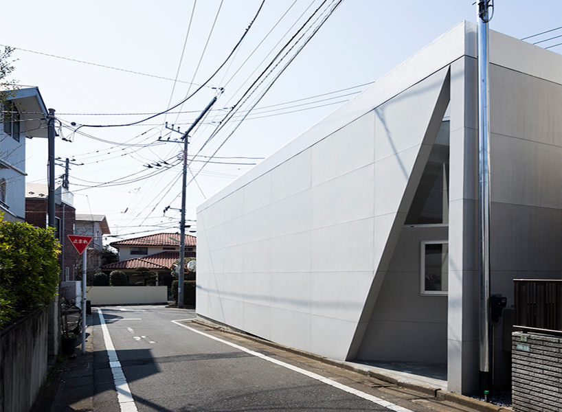 kamiuma house is distinguished by its triangular shape formed by two ...