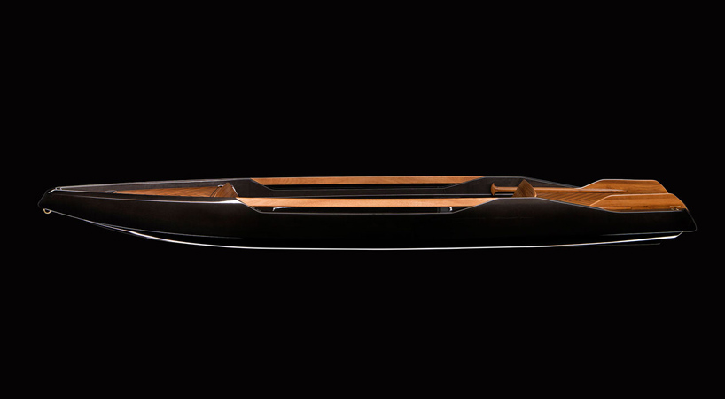 monocoque paddle canoe is crafted of copper-woven carbon 