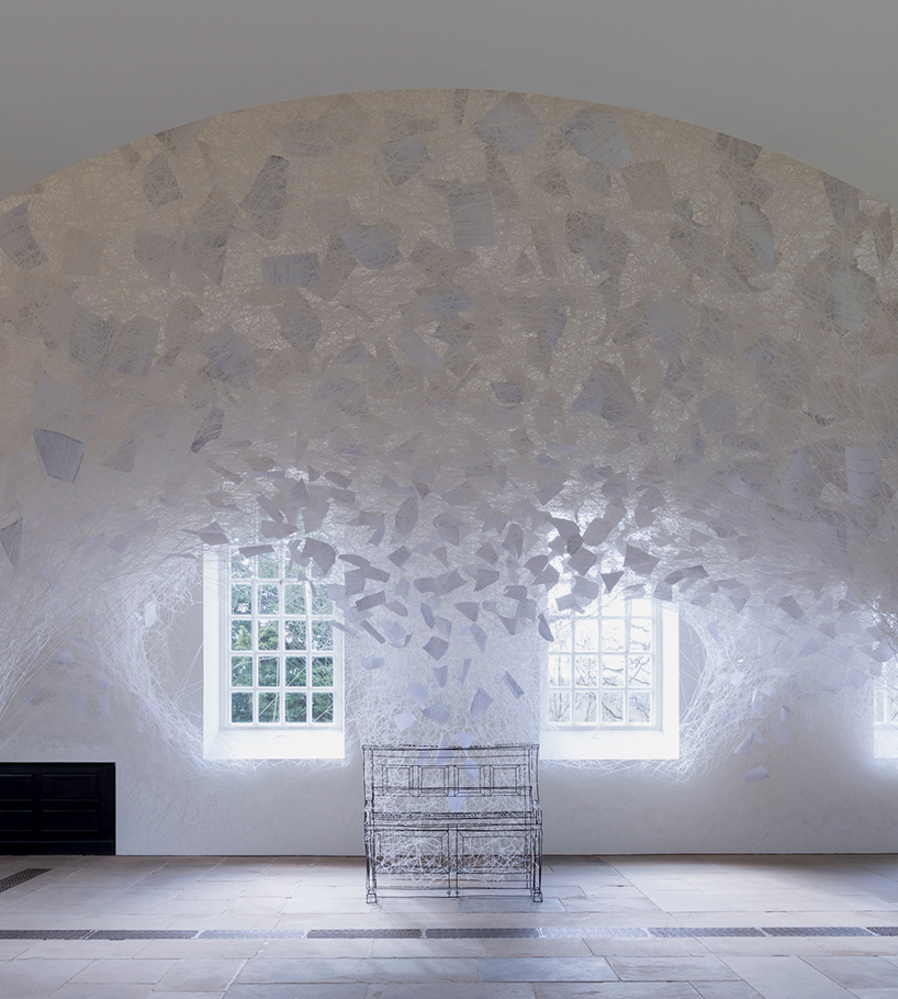 web of wool emerges from this steel piano at yorkshire sculpture park