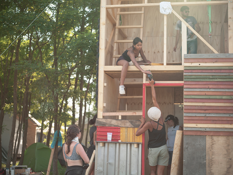 hello wood festival: students collaborate to build seven cabin prototypes