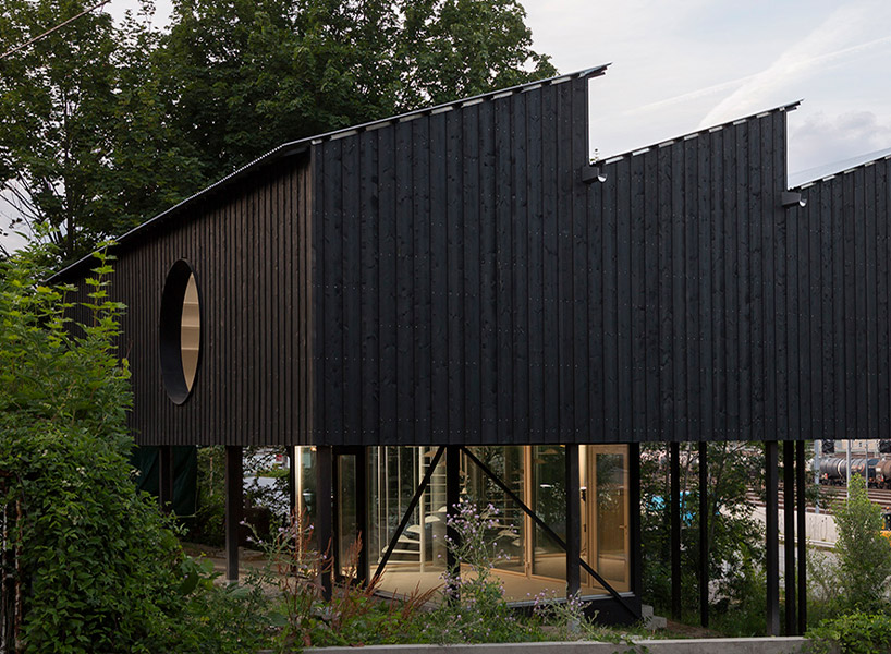 built almost entirely in wood, casa ccff proposes an alternative to the ...