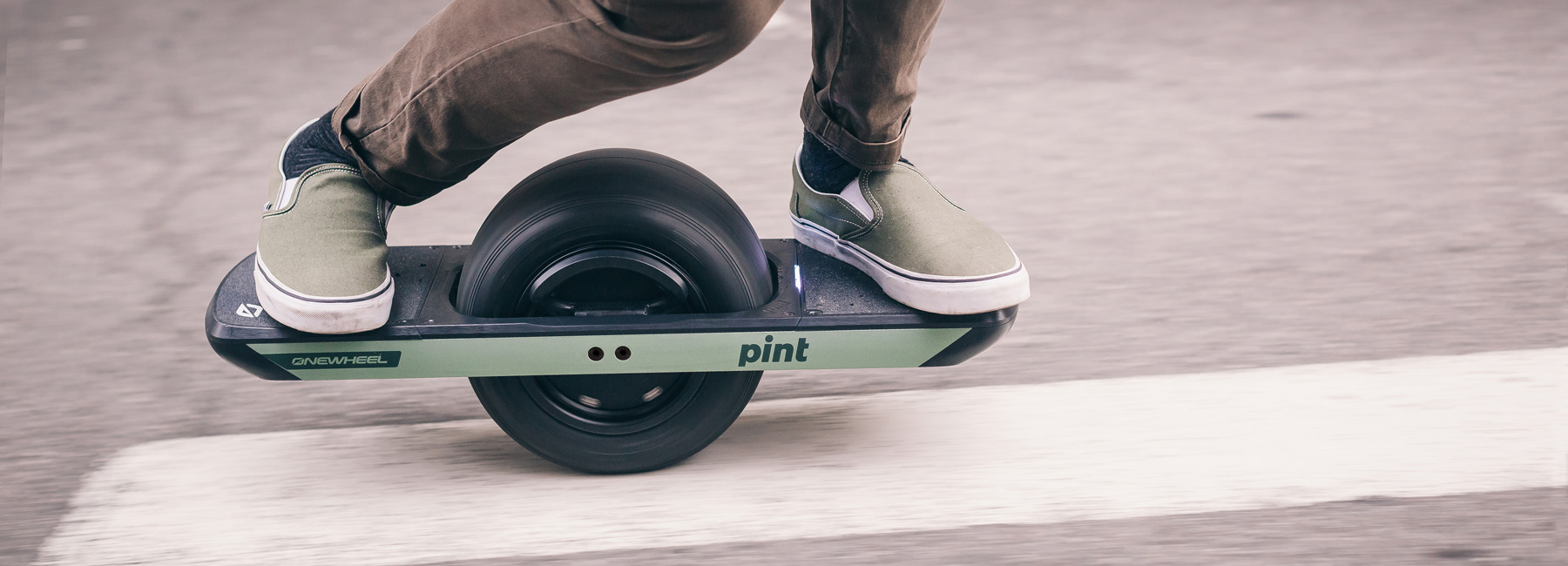 onewheel pint is a mini, portable one-wheeled skateboard for novices