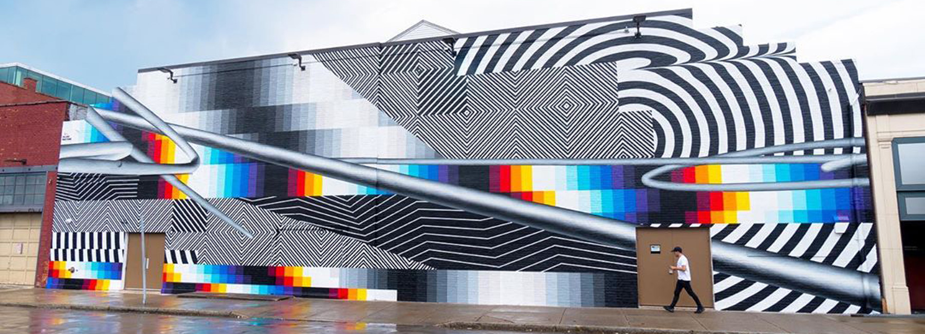 felipe pantone creates mural that digitalizes the facade of this new york concert hall