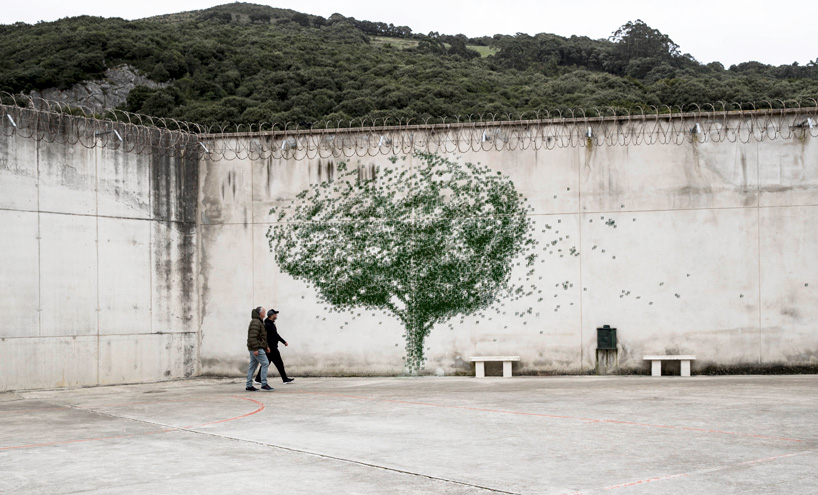 pejac's gravity-defying sneakers create surreal scenes on the