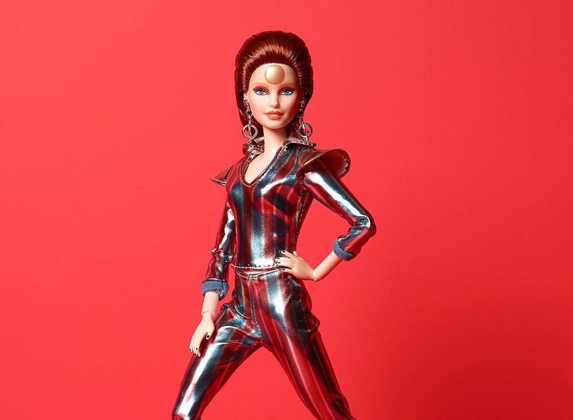 The New Barbie Sports A Striped Metallic Jumpsuit Matching Red Boots And A Backcombed Mane Of Hair 0407