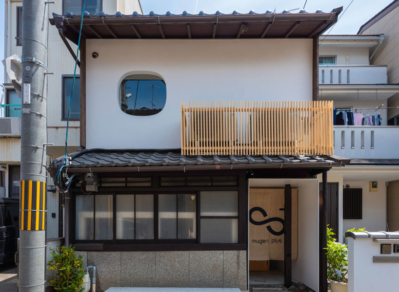 A Wooden Vertical Structure Has Been Inserted Within The Traditional Building