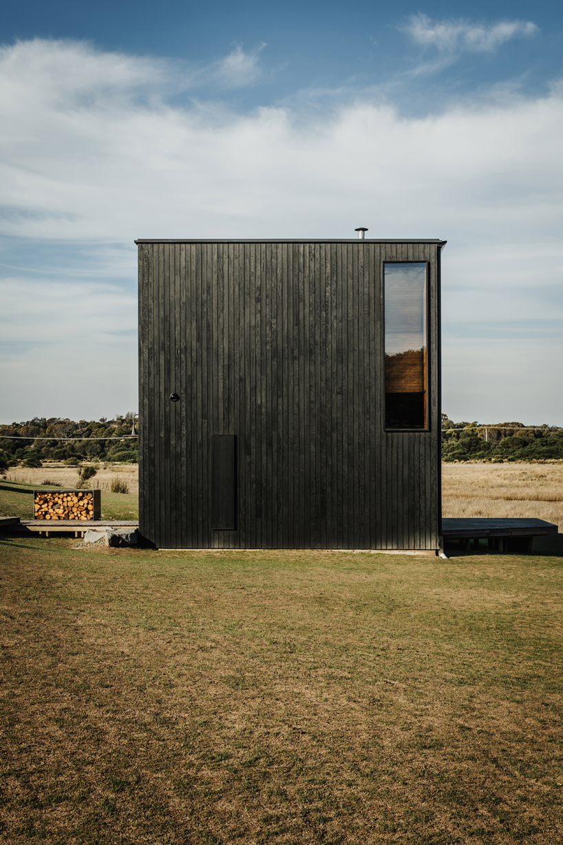 Taylor Hinds Architects Builds Tiny Black Cabin Retreat In Tasmania