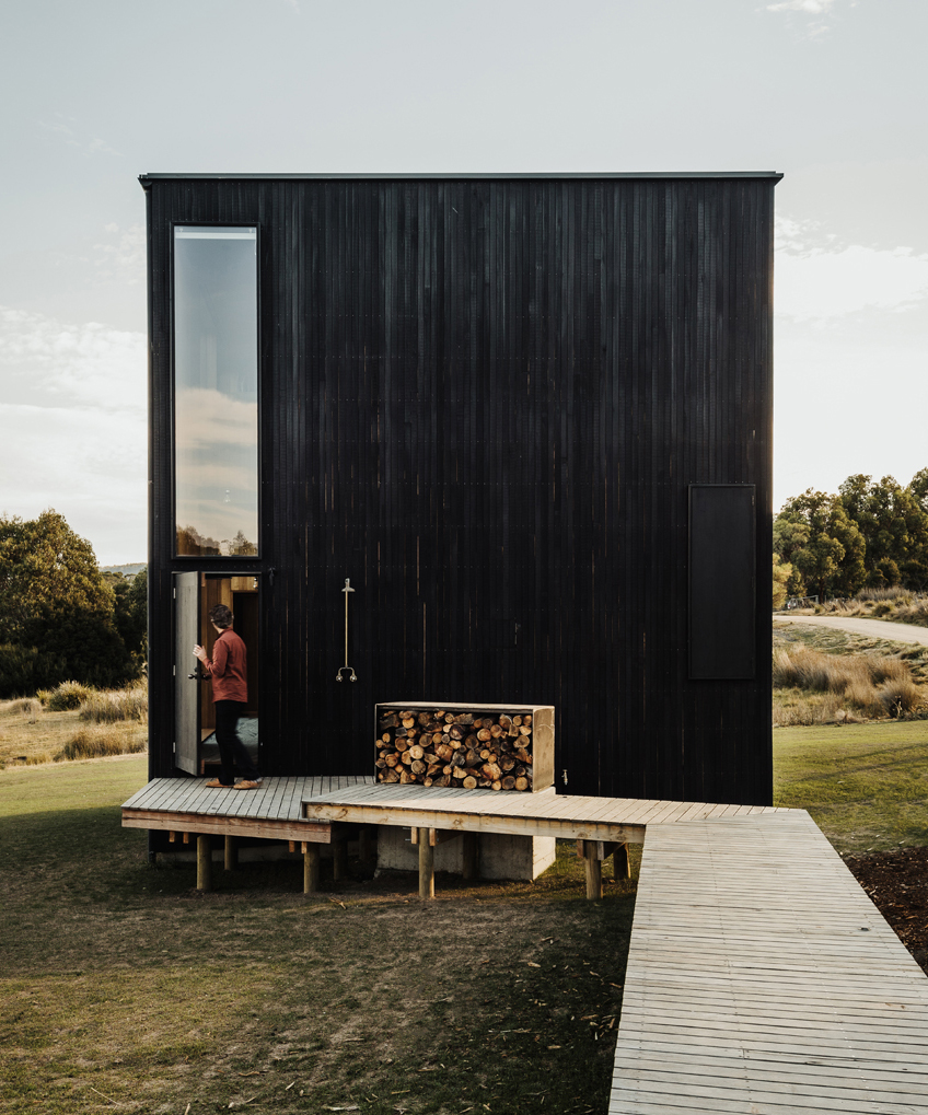 Taylor Hinds Architects Builds Tiny Black Cabin Retreat In Tasmania