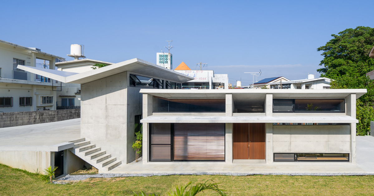 Studio Monaka Tops Concrete house Om In Japan With A V shaped Roof 