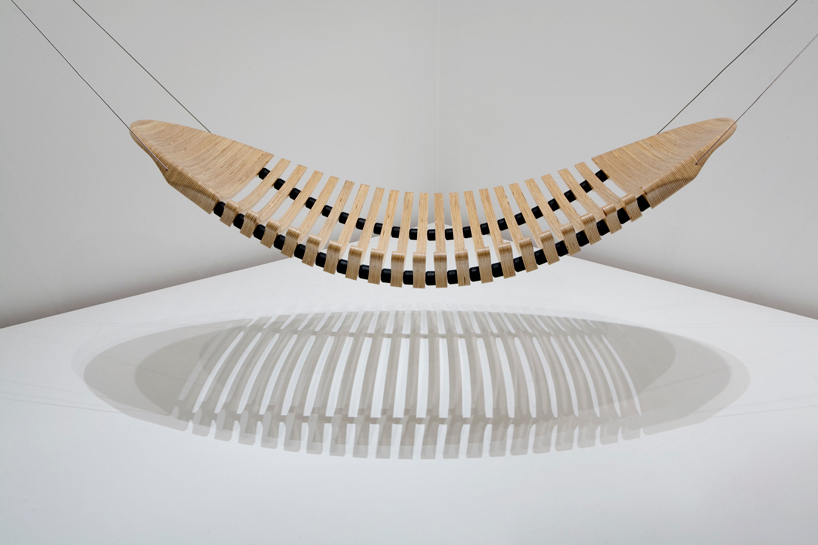 Door lever Verrijking adam cornish designs wooden hammock that mimics the human spine