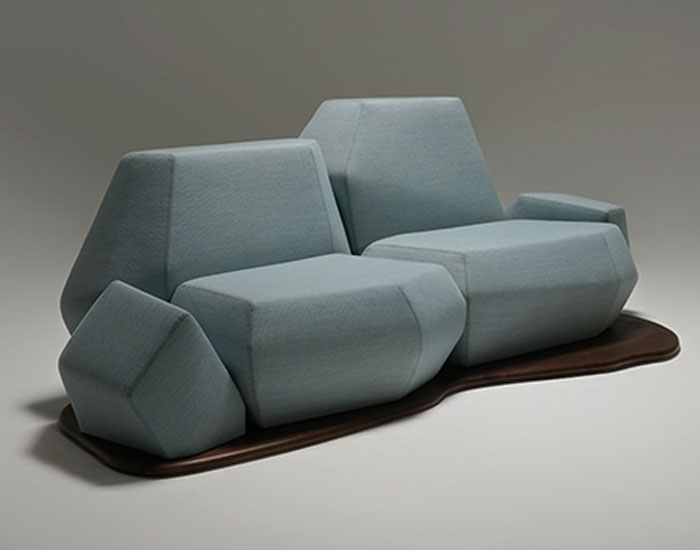 the blocks of the sofa are shaped like sculptures and provide different ...