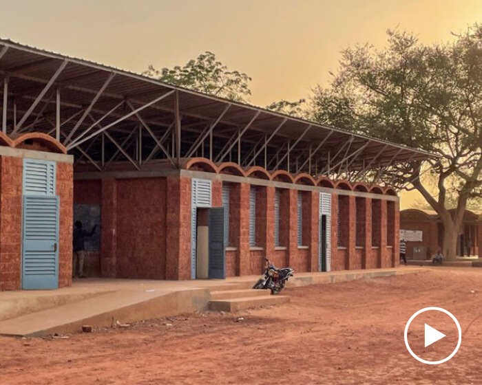 article 25 builds a school in niger using locally sourced laterite stone