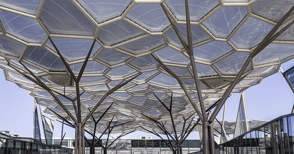 Tree Shaped Steel Columns Organic Undulating Roof Trade Show Italy Designboom 1200 