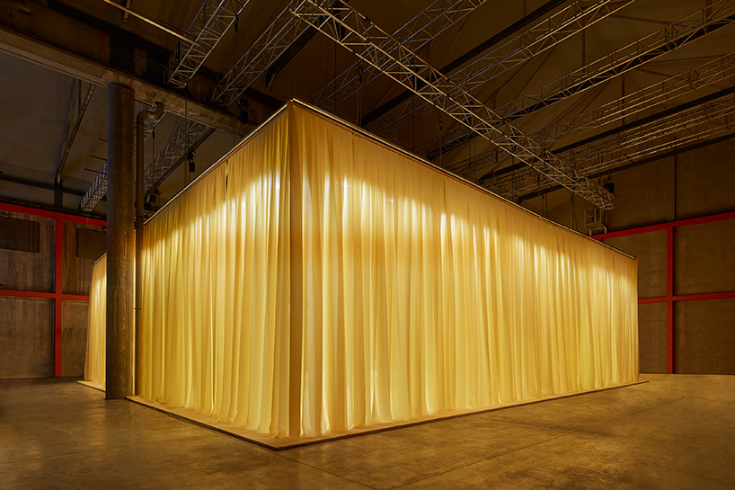 OMA/AMO designs yellow, intimate and tactile space for prada's SS21 virtual  show