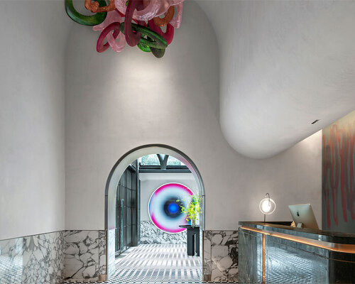 'blackstone M+' music hotel combines traditional shanghai style with art deco elements