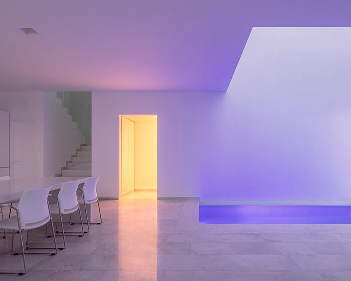 abraham cota paredes designs minimal, all-white house with an indoor pool in mexico